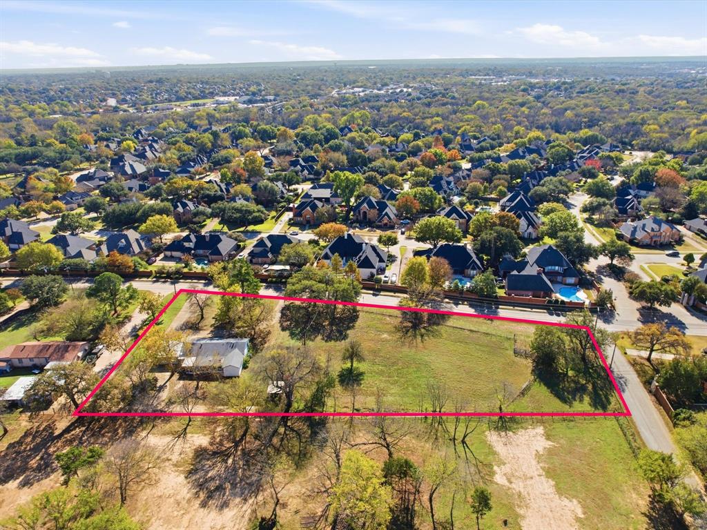 108 Glade Road Colleyville, TX 76034 - Photo 6 of 7 an aerial view of residential houses with outdoor space
