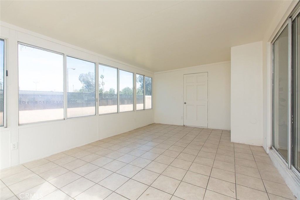 3790 Nut Tree Lane Riverside, CA 92501 - Photo 13 of 31 a view of an empty room with a window