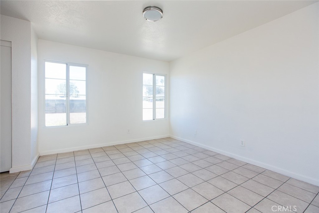 3790 Nut Tree Lane Riverside, CA 92501 - Photo 15 of 31 an empty room with windows