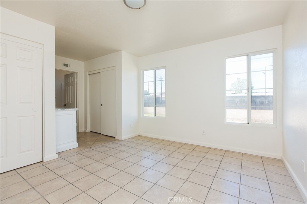 3790 Nut Tree Lane Riverside, CA 92501 - Photo 16 of 31 an empty room with windows