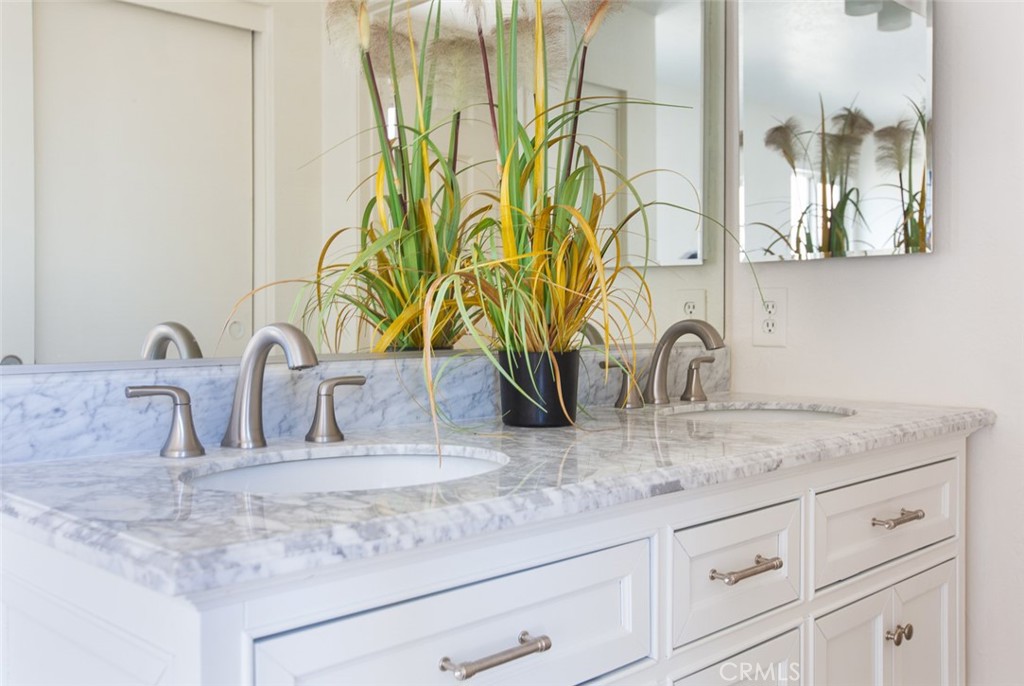 3790 Nut Tree Lane Riverside, CA 92501 - Photo 18 of 31 a bathroom with sink and mirror