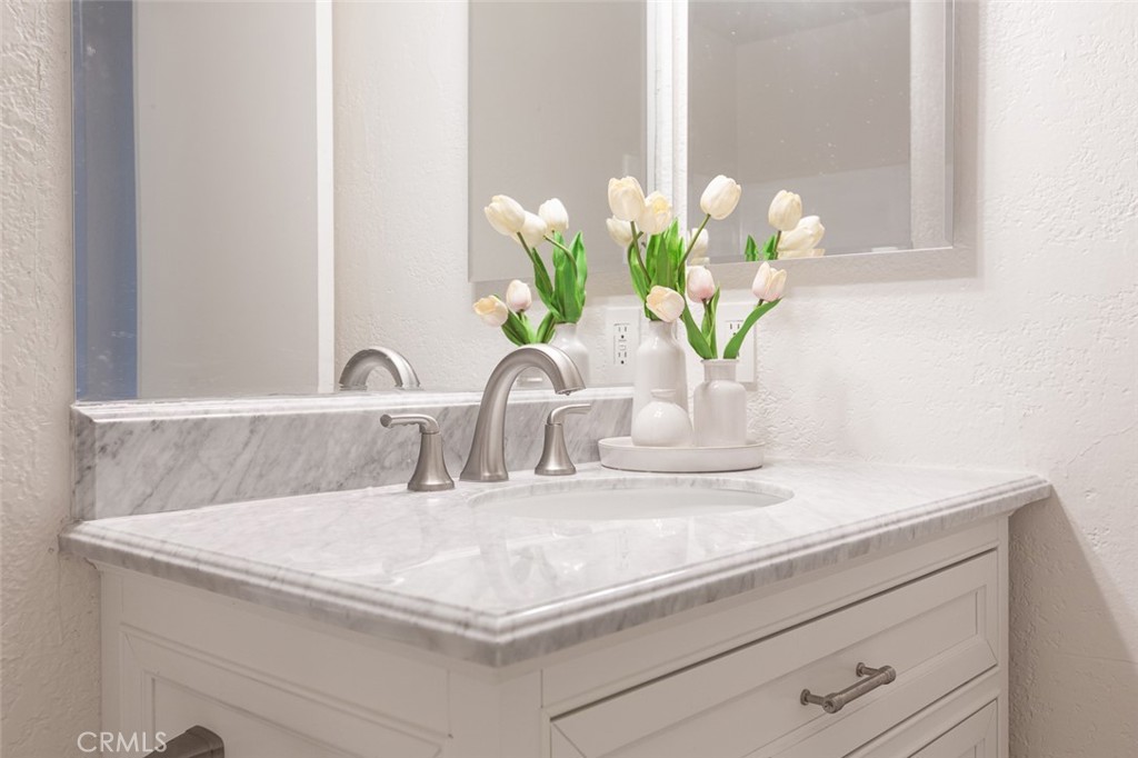 3790 Nut Tree Lane Riverside, CA 92501 - Photo 25 of 31 a close view of sink with granite counter top