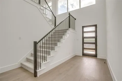 a view of entryway with stairs
