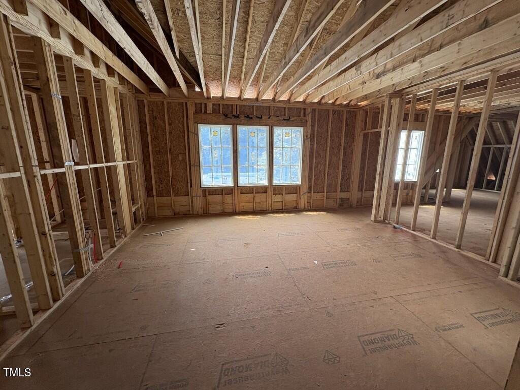 3358 Hampton Road Raleigh, NC 27607 - Photo 15 of 27 a view of empty room with stairs and door