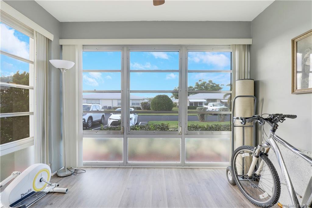 211 Manatee Lane, Unit D Fort Pierce, FL 34982 - Photo 13 of 25 a view of a room with gym equipment