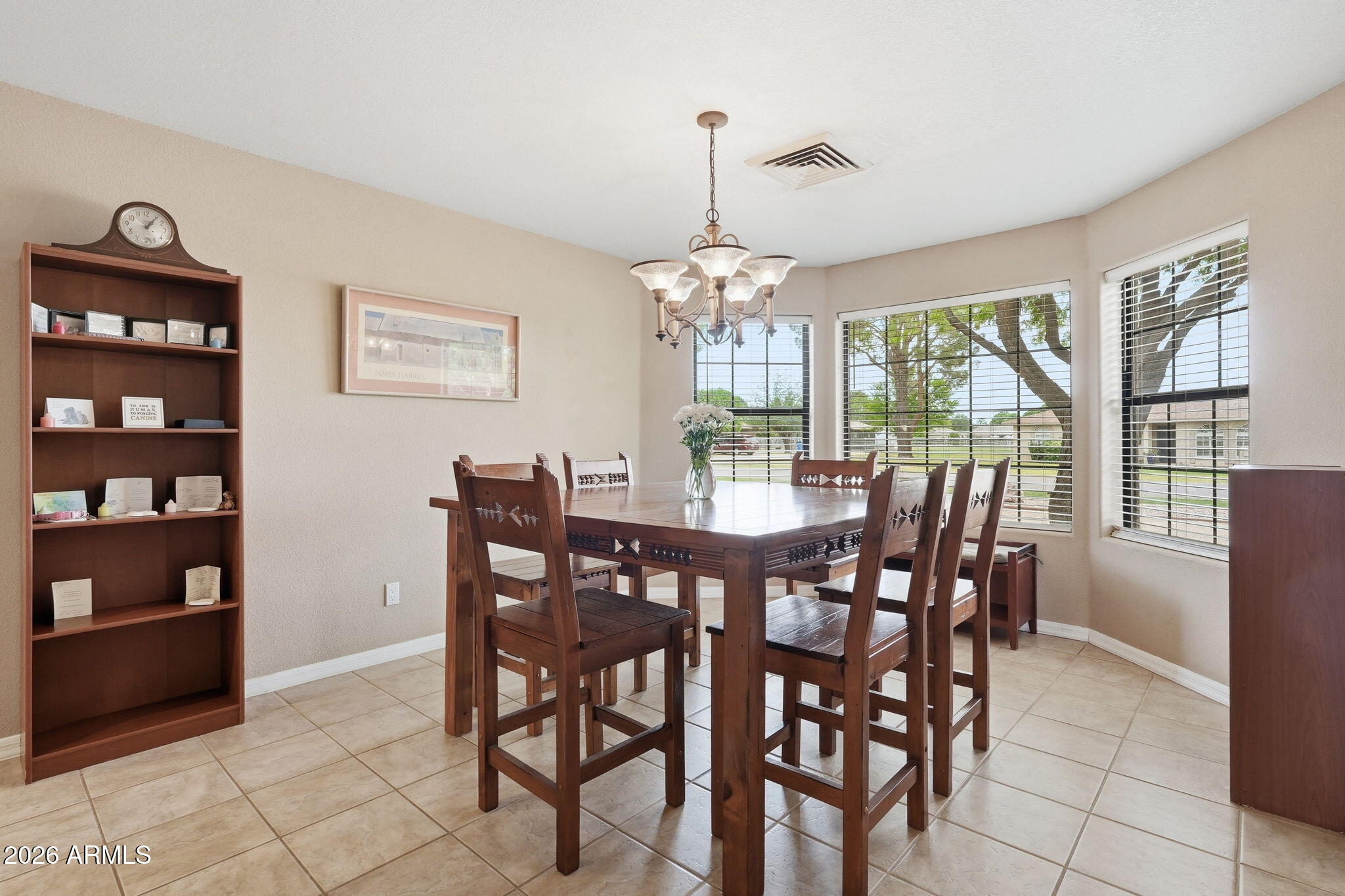 332 East Harrison Street Gilbert, AZ 85295 - Photo 34 of 101 a view of a dining room with furniture wooden floor and chandelier