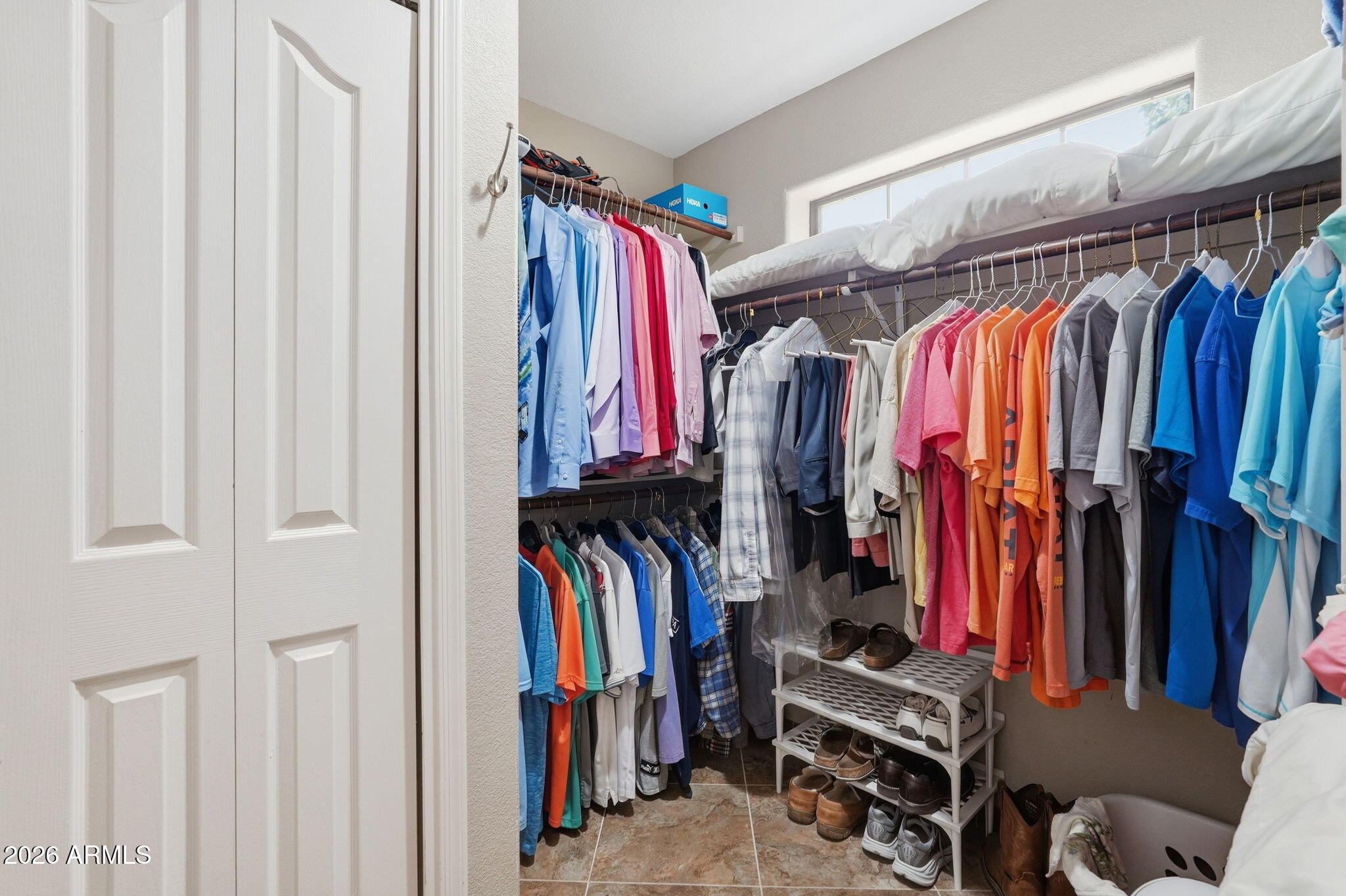 332 East Harrison Street Gilbert, AZ 85295 - Photo 47 of 101 a view of walk in closet with clothes