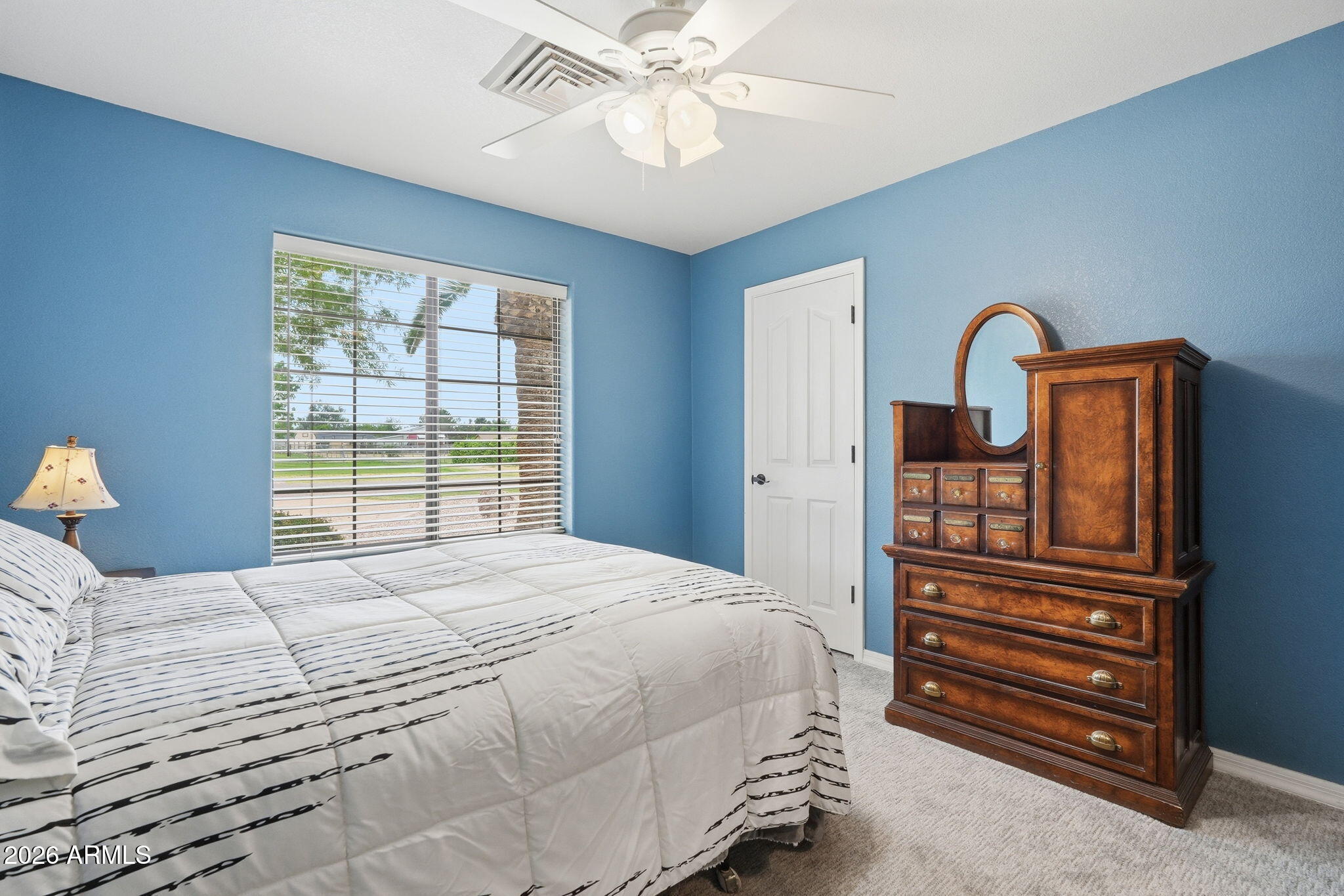 332 East Harrison Street Gilbert, AZ 85295 - Photo 48 of 101 a bedroom with a bed and a chandelier