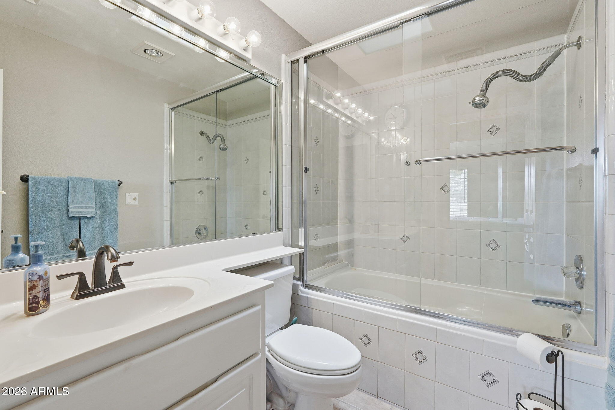 332 East Harrison Street Gilbert, AZ 85295 - Photo 50 of 101 a bathroom with a sink a toilet and shower
