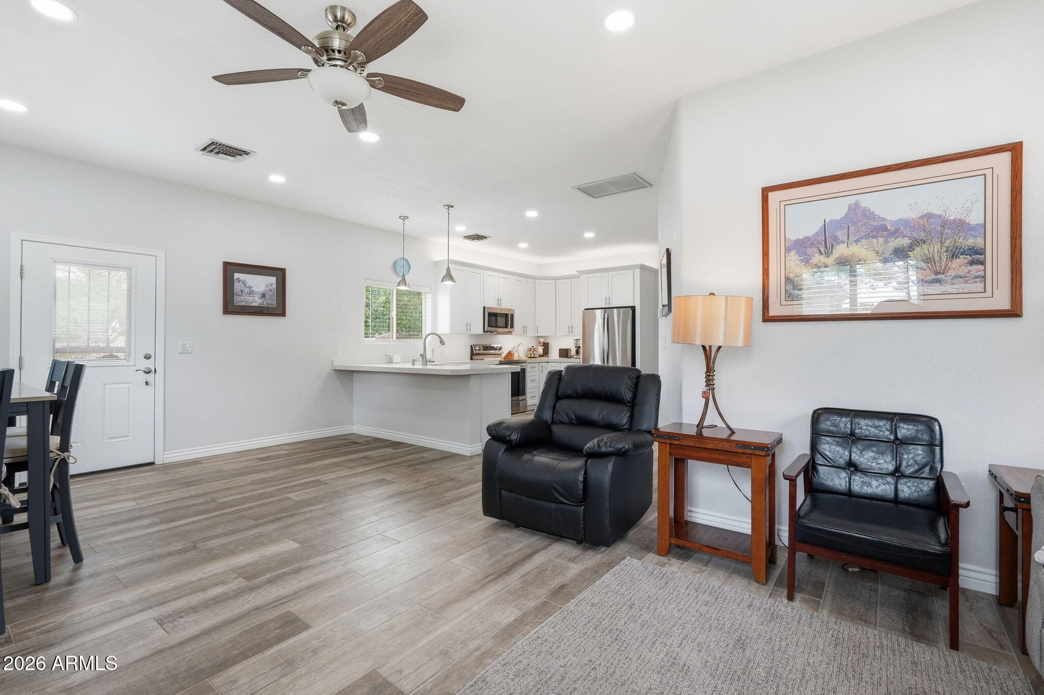 332 East Harrison Street Gilbert, AZ 85295 - Photo 61 of 101 a living room with furniture and a ceiling fan
