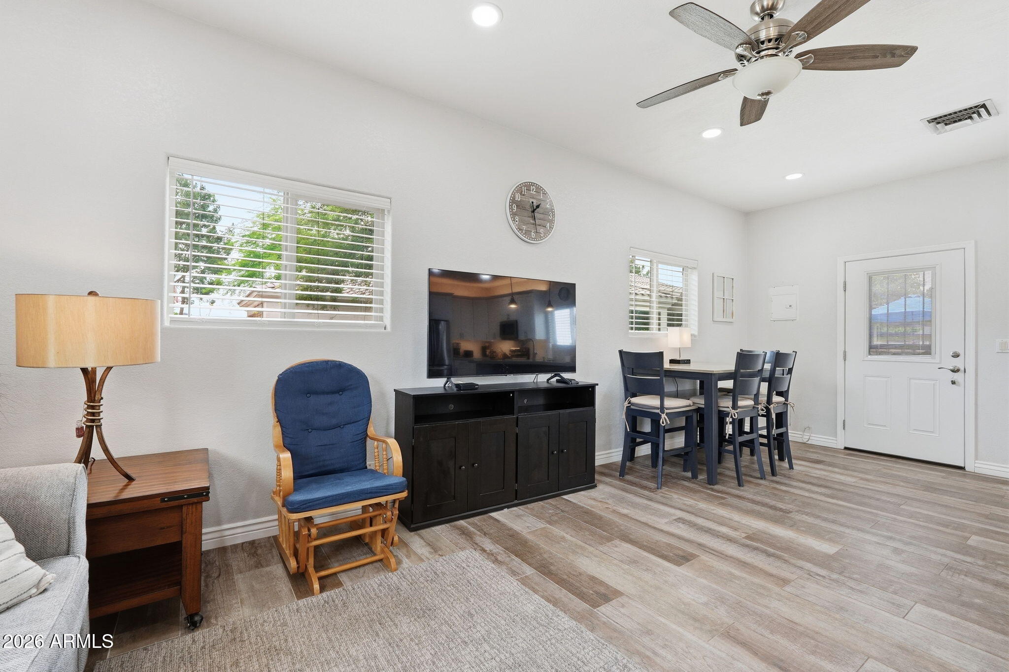 332 East Harrison Street Gilbert, AZ 85295 - Photo 62 of 101 a living room with furniture window and wooden floor