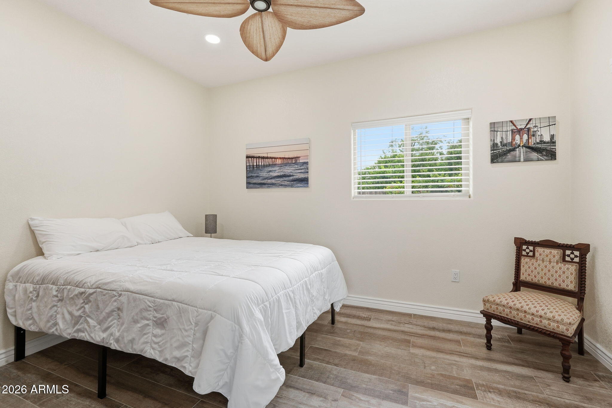 332 East Harrison Street Gilbert, AZ 85295 - Photo 64 of 101 a bedroom with a bed and a chandelier