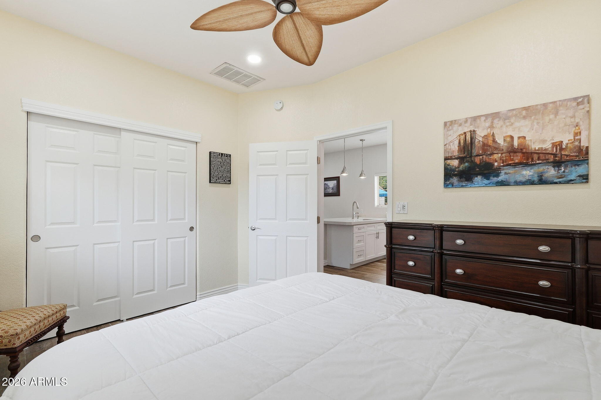 332 East Harrison Street Gilbert, AZ 85295 - Photo 65 of 101 a bedroom with a bed and cabinets