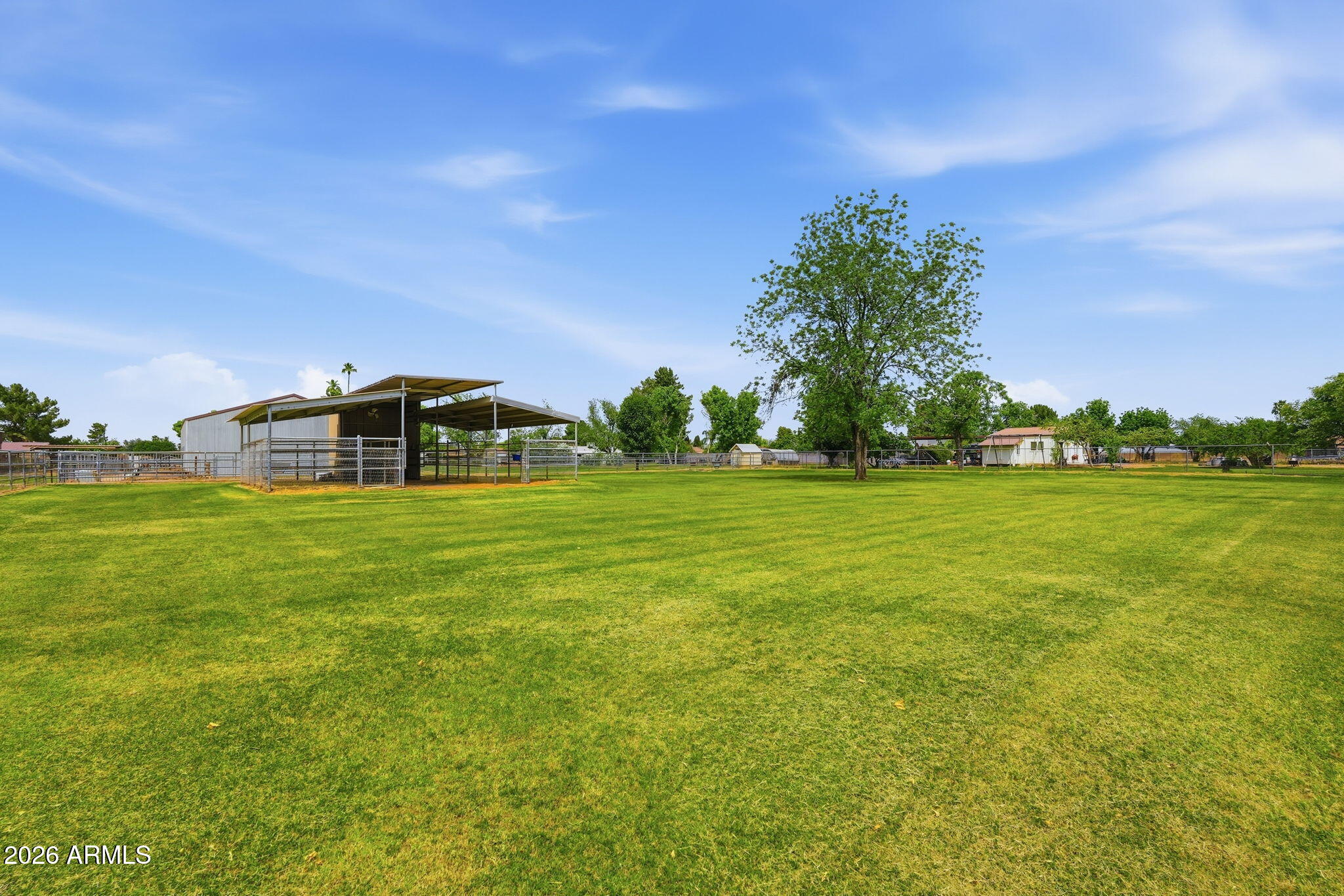 332 East Harrison Street Gilbert, AZ 85295 - Photo 85 of 101 a view of a green field with house in the background