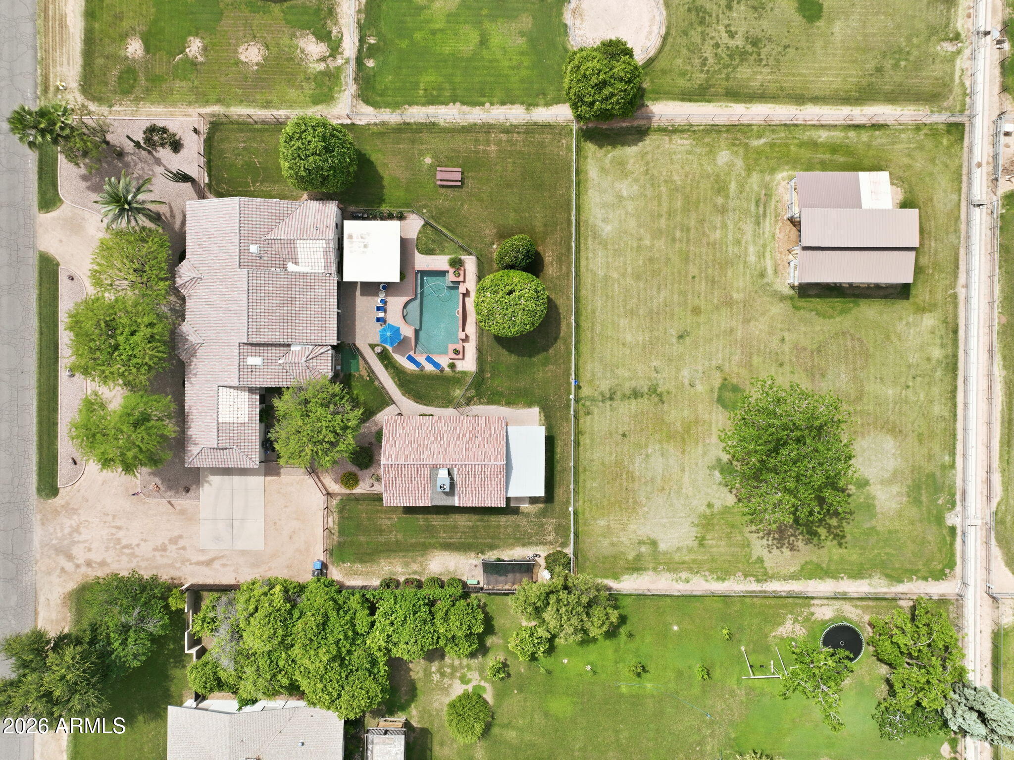332 East Harrison Street Gilbert, AZ 85295 - Photo 5 of 101 an aerial view of residential house with pool and yard