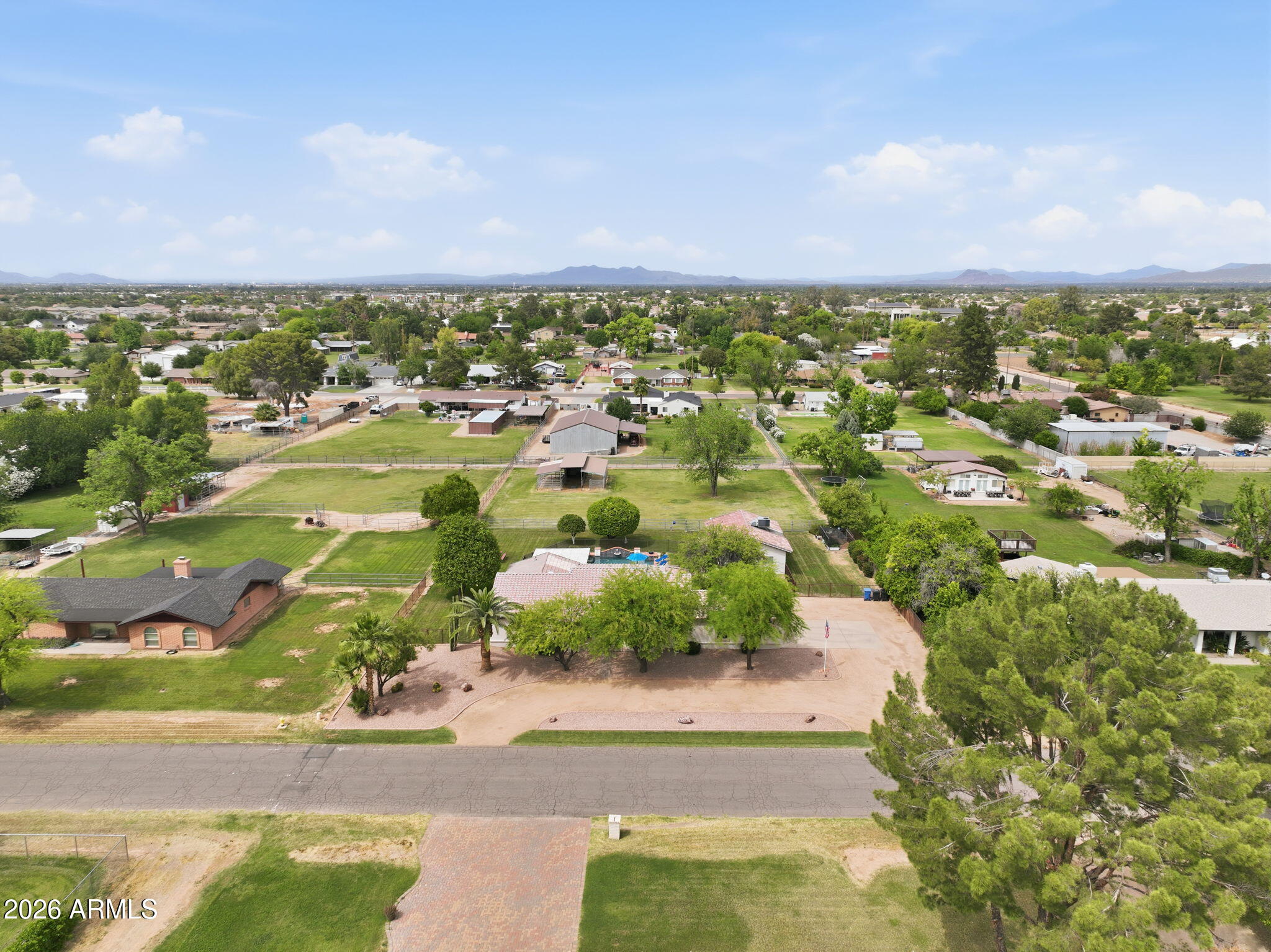 332 East Harrison Street Gilbert, AZ 85295 - Photo 87 of 101 an aerial view of residential houses with outdoor space and trees