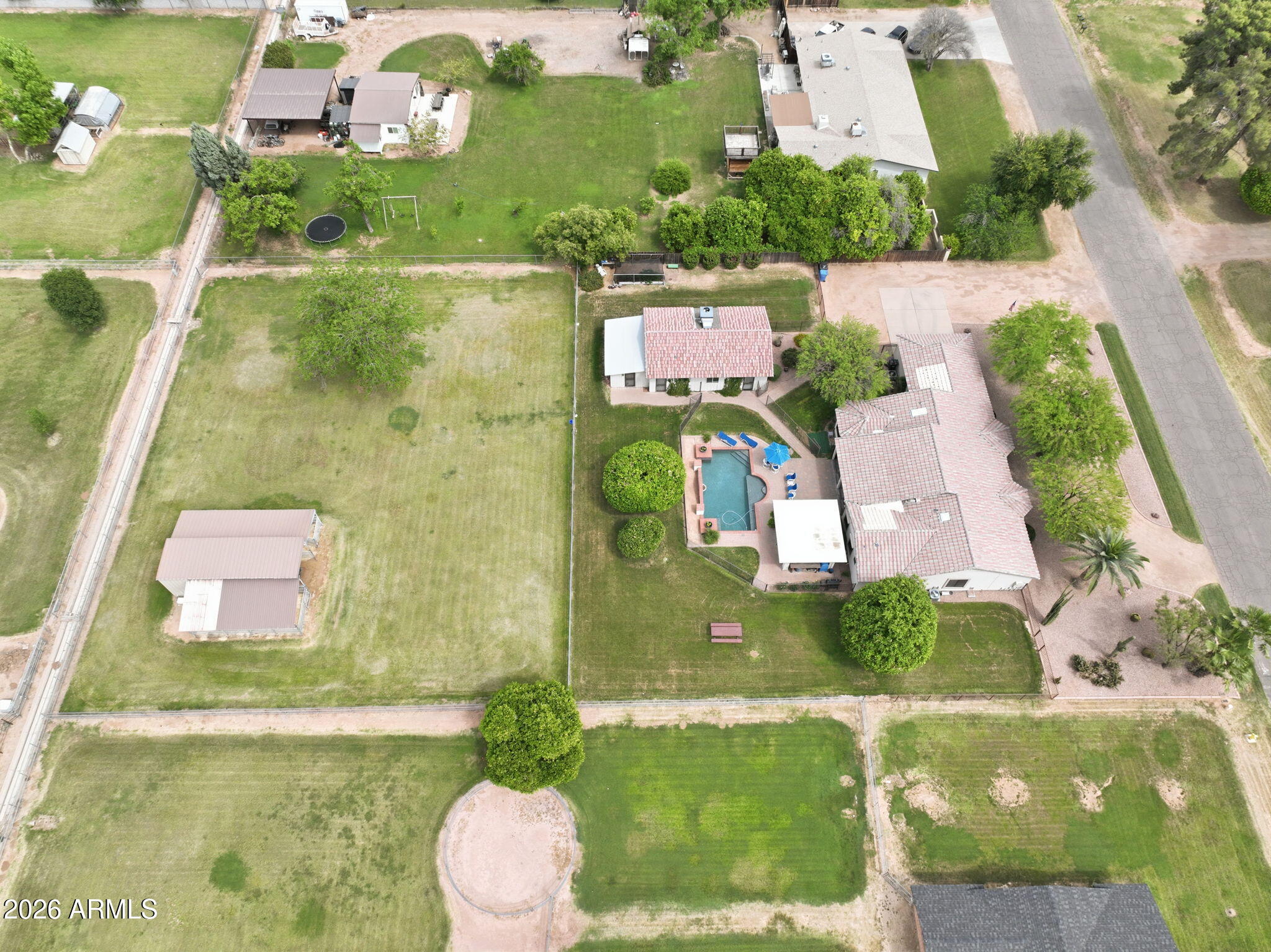 332 East Harrison Street Gilbert, AZ 85295 - Photo 6 of 101 an aerial view of residential house with outdoor space and swimming pool