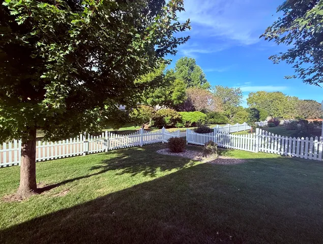 a view of a kitchen sink and stove
