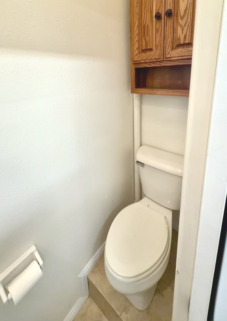 1606 East Marc Trail Urbana, IL 61802 - Photo 143 of 160 a white toilet sitting next to a sink