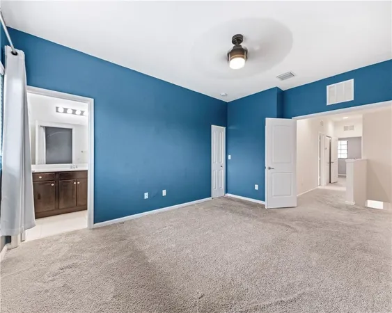 a view of a livingroom with a ceiling fan