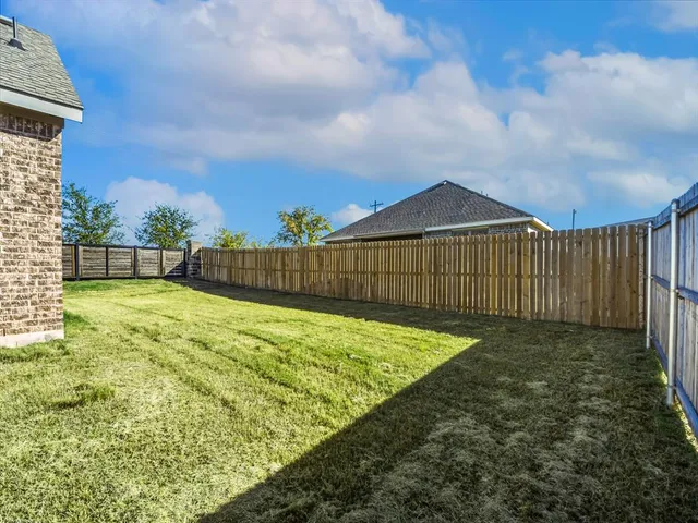 a view of outdoor space and yard