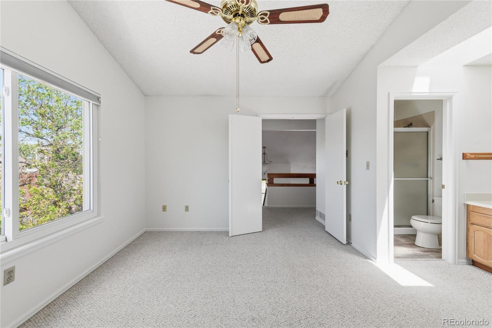 155 Blue Spruce Court Highlands Ranch, CO 80126 - Photo 18 of 29 a view of an empty room with a window