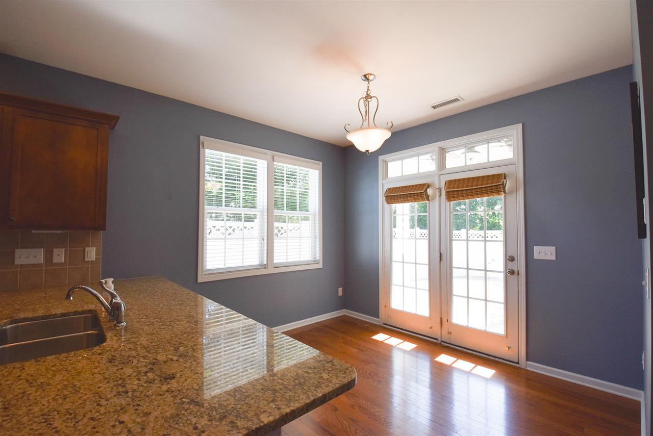 2712 Cloud Mist Circle Raleigh, NC 27614 - Photo 10 of 30 The sunny Breakfast area has a brushed nickel light fixture and french doors to the large, private fenced-in Patio. Breakfast Area