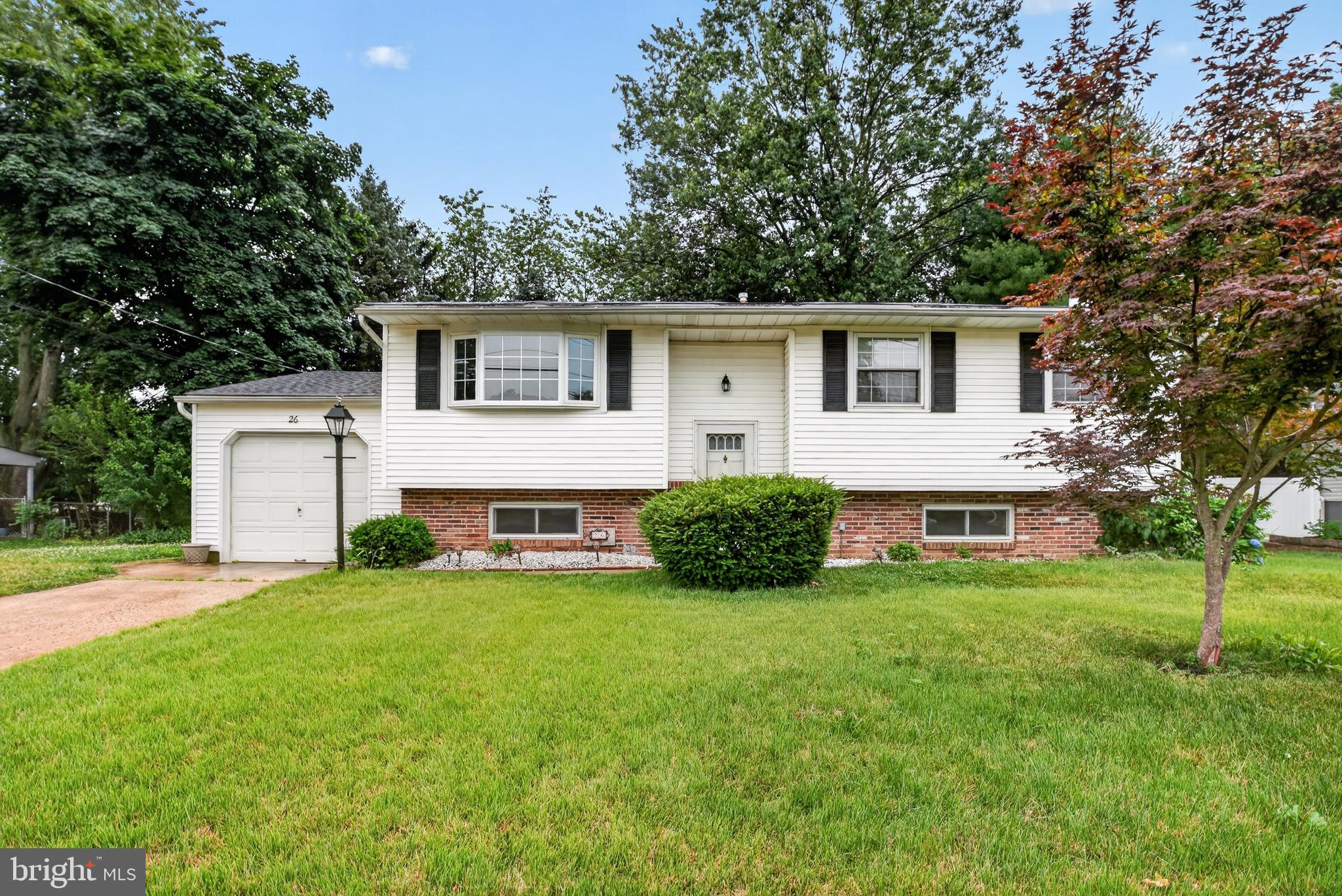26 Glenwood Road Lumberton, NJ 08048 - Photo 1 of 37 Charming home with lush greenery.