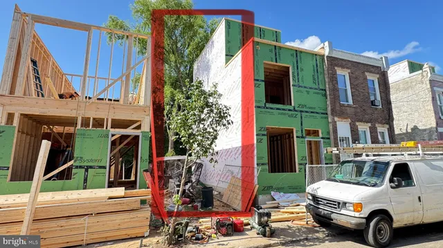 a car parked in front of a house