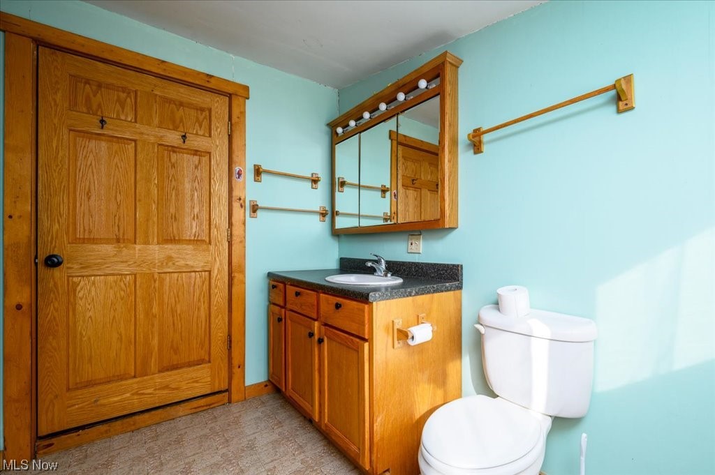 2641 Tower Road Jefferson, OH 44047 - Photo 21 of 35 Bathroom featuring vanity and toilet