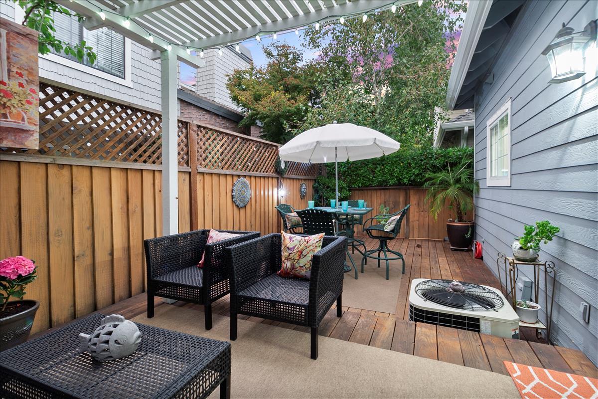 136 Redding Road Campbell, CA 95008 - Photo 13 of 30 a view of a patio with furniture and table under an umbrella
