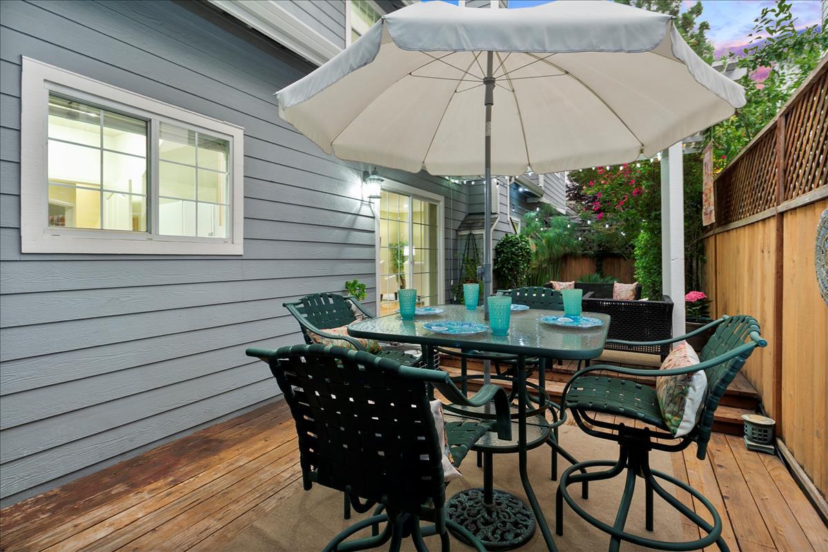 136 Redding Road Campbell, CA 95008 - Photo 14 of 30 a view of an outdoor sitting area with furniture and umbrella