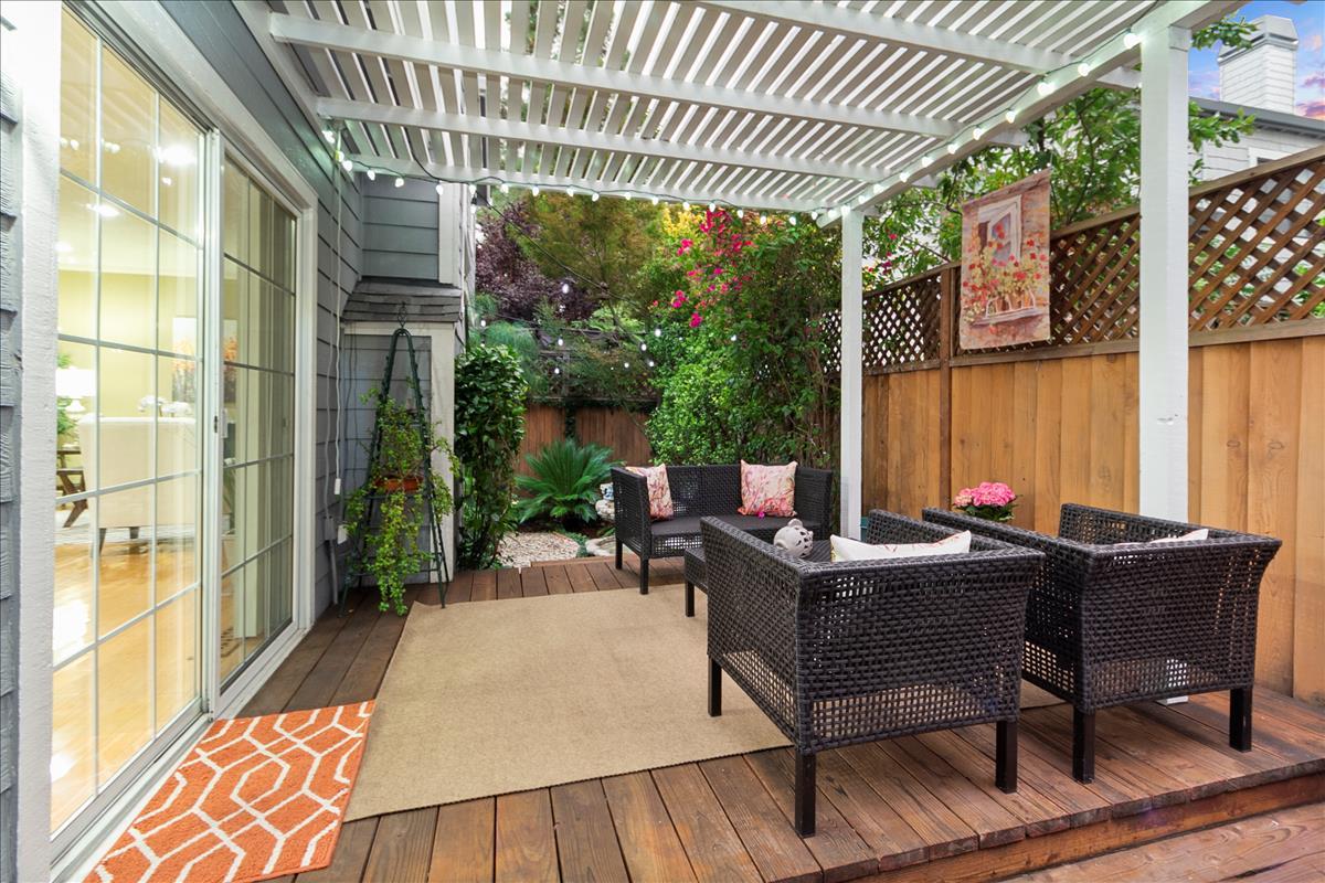 136 Redding Road Campbell, CA 95008 - Photo 15 of 30 a view of a patio with table and chairs and potted plants