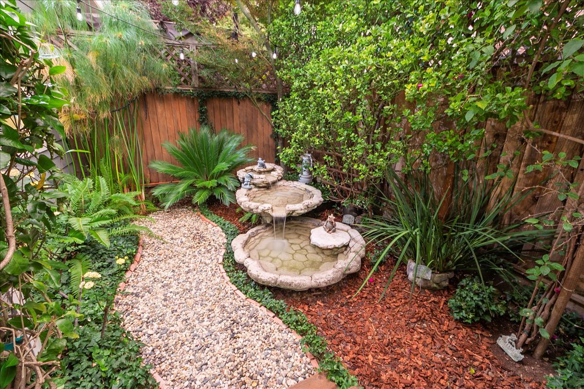 136 Redding Road Campbell, CA 95008 - Photo 16 of 30 a backyard of a house with a yard and outdoor seating