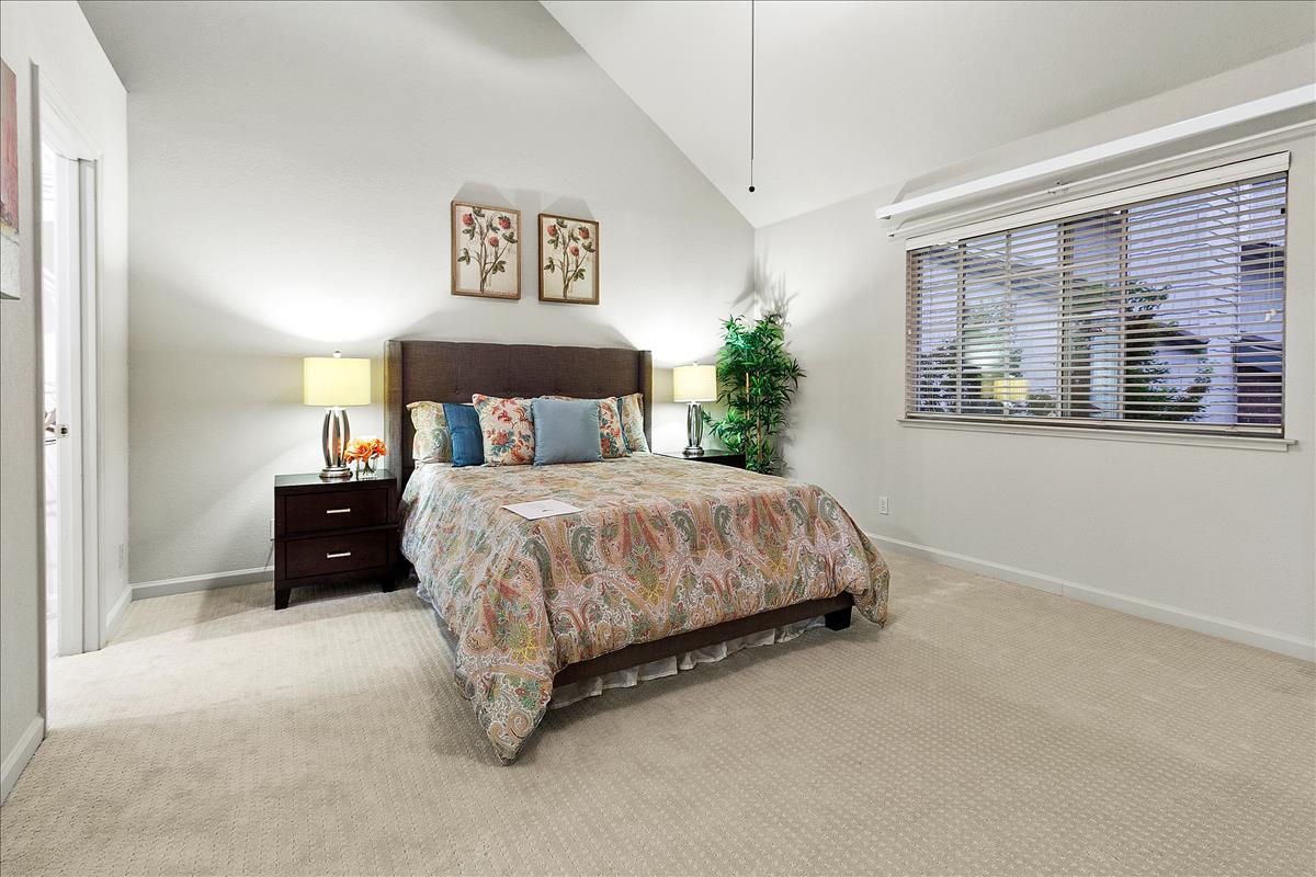136 Redding Road Campbell, CA 95008 - Photo 19 of 30 a bed sitting in a bedroom next to a window