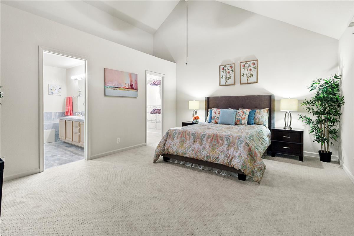136 Redding Road Campbell, CA 95008 - Photo 20 of 30 a spacious bedroom with a bed and a cabinets