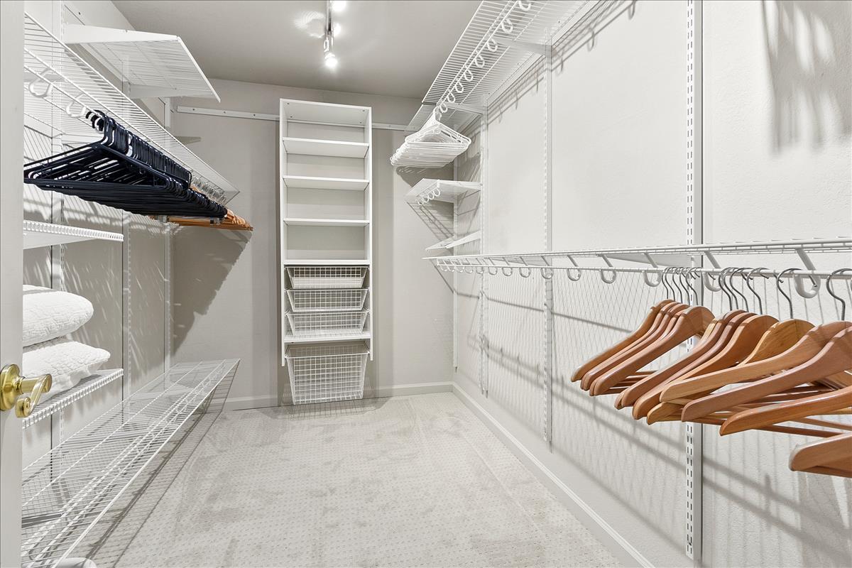 136 Redding Road Campbell, CA 95008 - Photo 22 of 30 a view of walk in closet with clothes and shoes