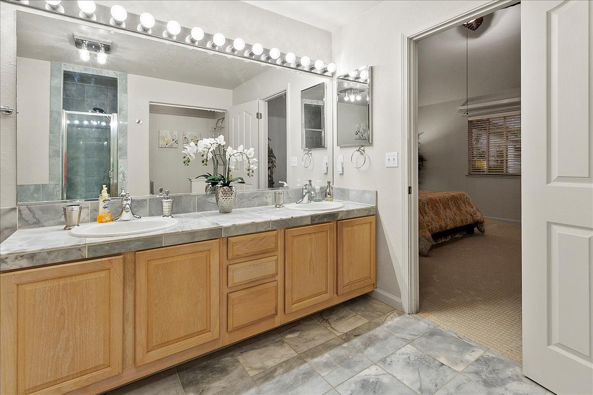 136 Redding Road Campbell, CA 95008 - Photo 24 of 30 a en suite bathroom with double sink and a mirror