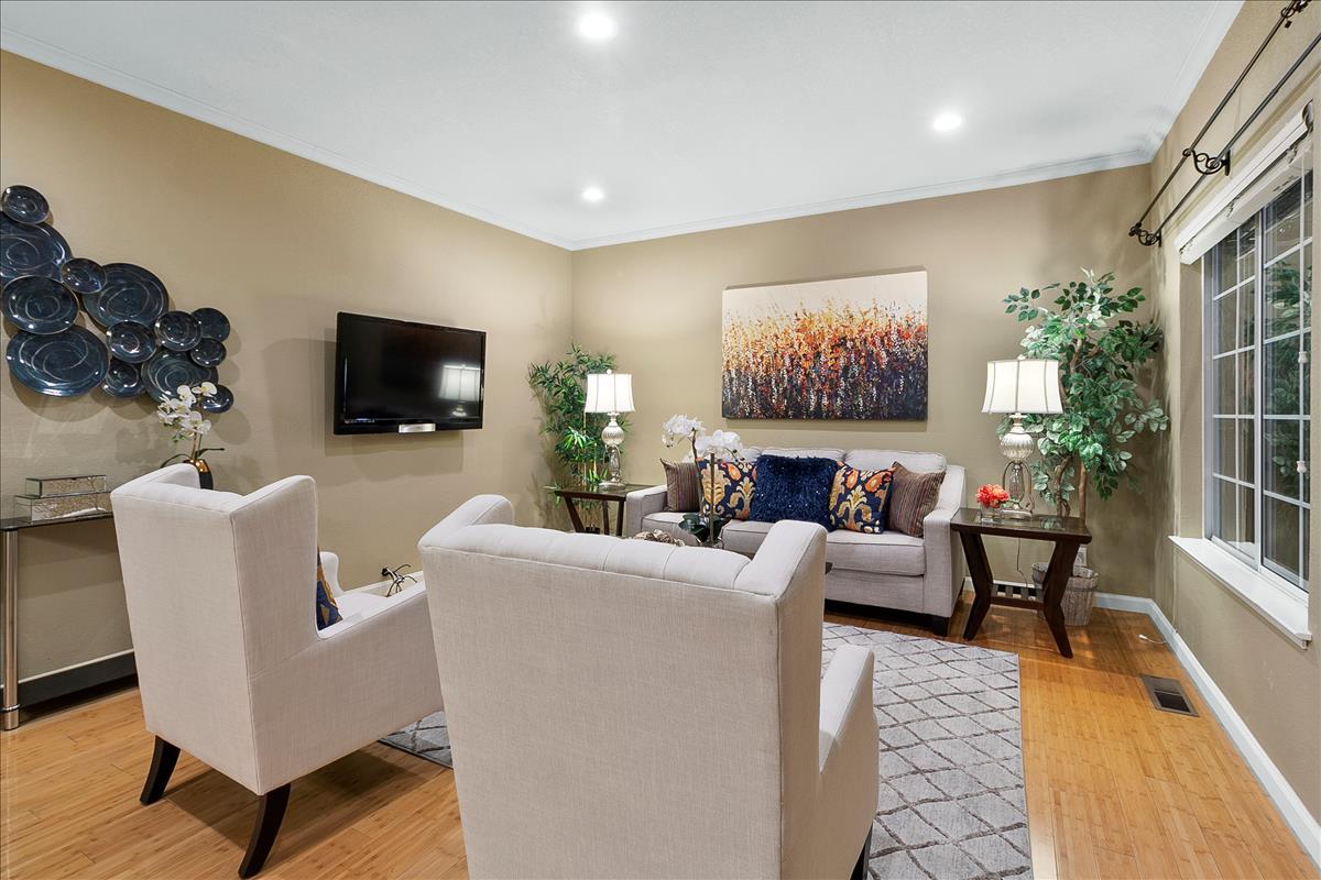 136 Redding Road Campbell, CA 95008 - Photo 5 of 30 a living room with furniture and a flat screen tv