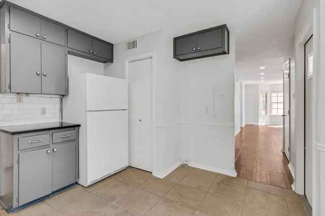 a view of a entryway with wooden floor