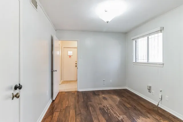 a kitchen that has a sink and a stove