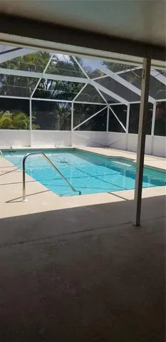 a house view with a backyard