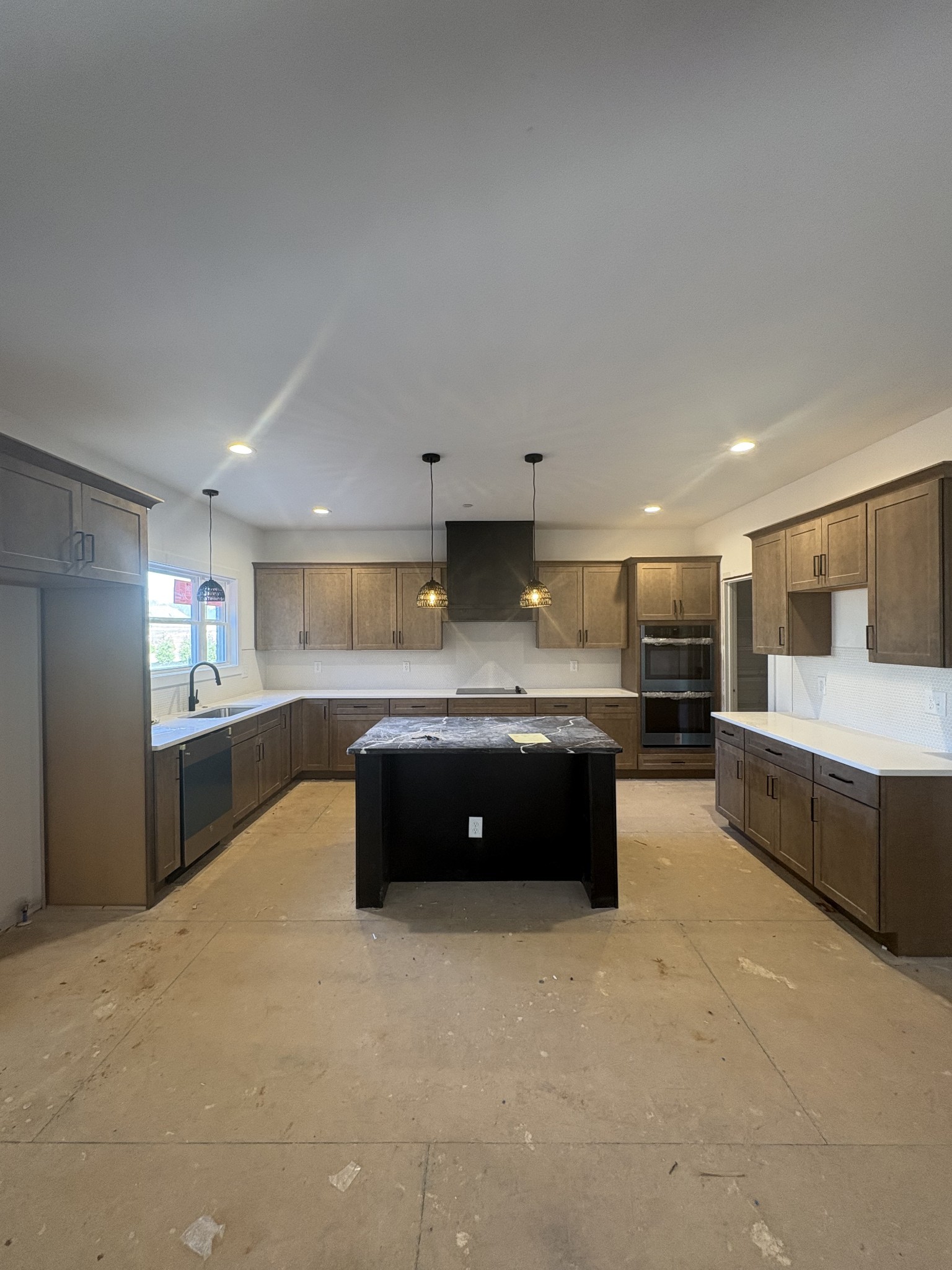 370 Young Lane Pleasant View, TN 37146 - Photo 11 of 27 a large kitchen with a large counter top stainless steel appliances and cabinets