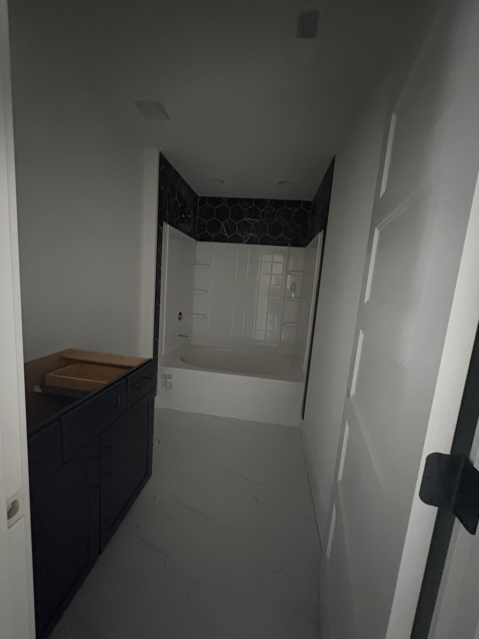 370 Young Lane Pleasant View, TN 37146 - Photo 21 of 27 a bathroom with a bathtub