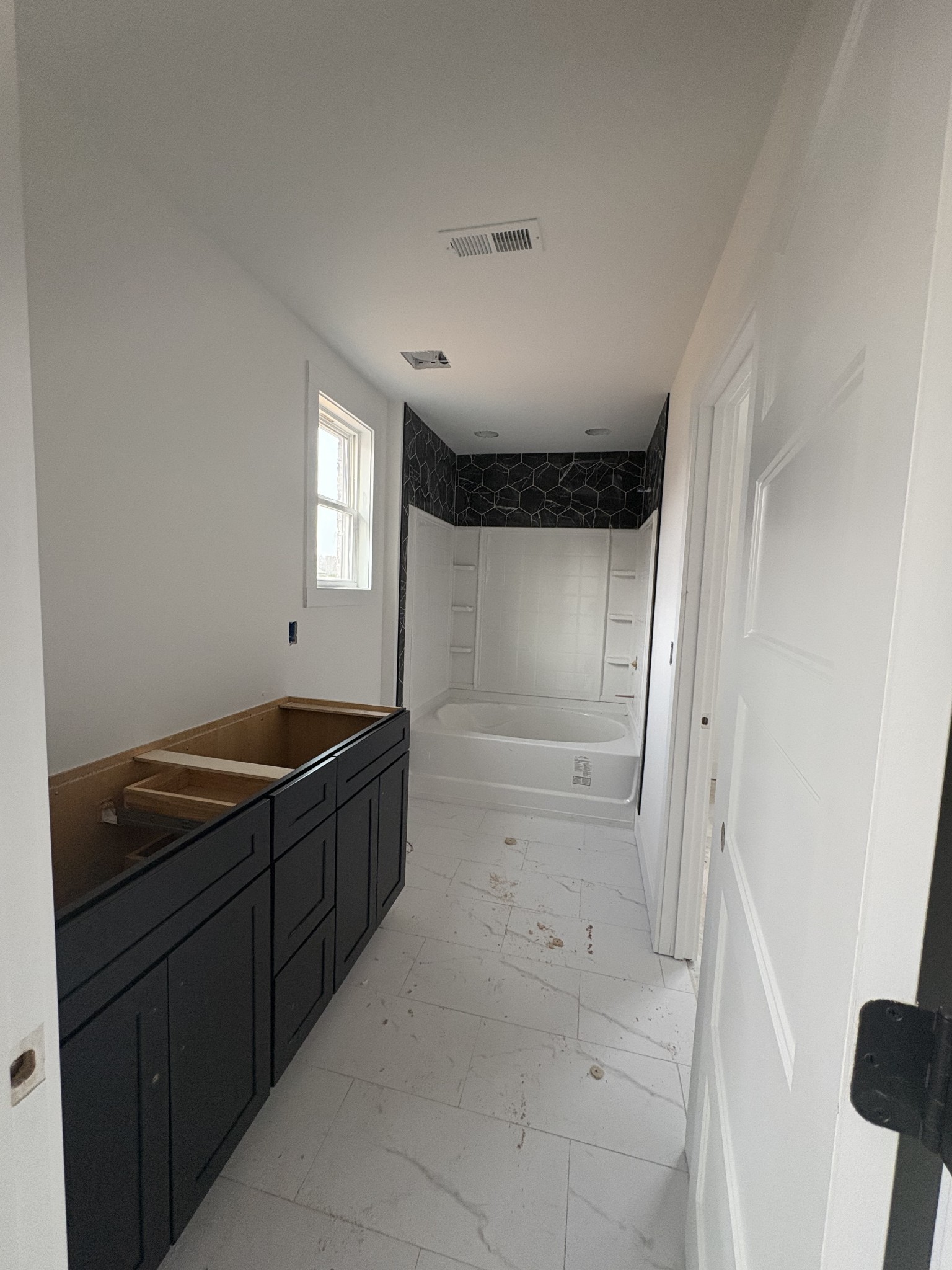 370 Young Lane Pleasant View, TN 37146 - Photo 24 of 27 a bathroom with a granite countertop sink a toilet and shower