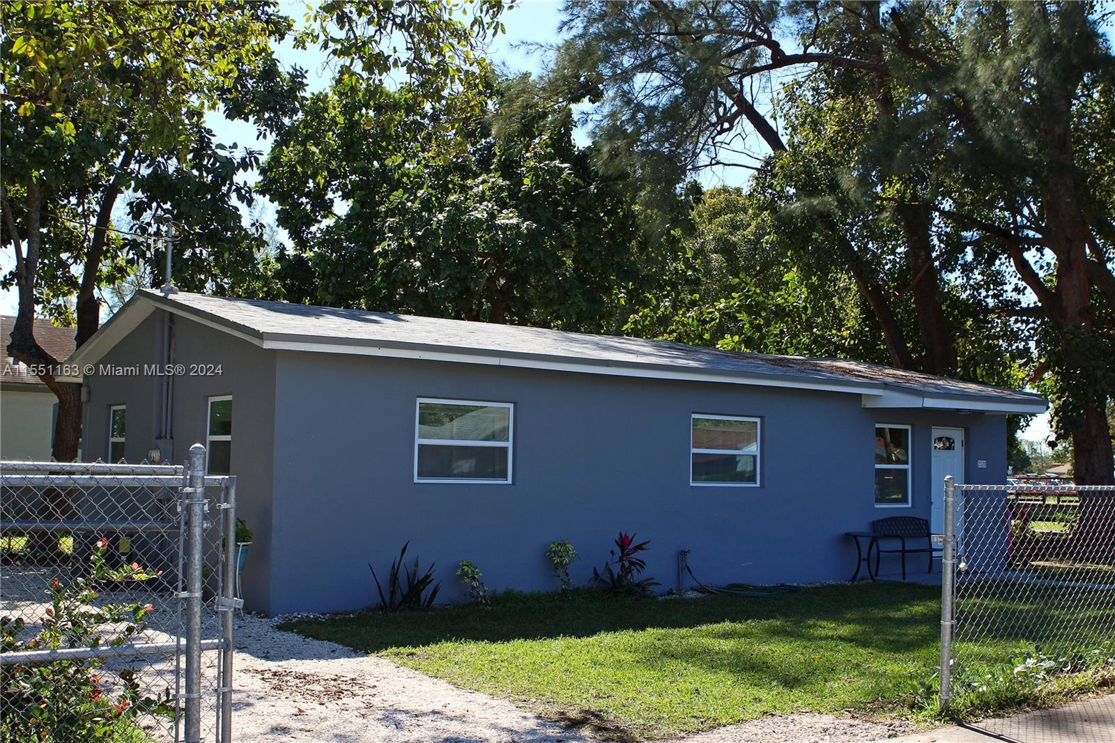 Gladeview Miami, FL 33147 - Photo 4 of 25 a front view of a house with garden