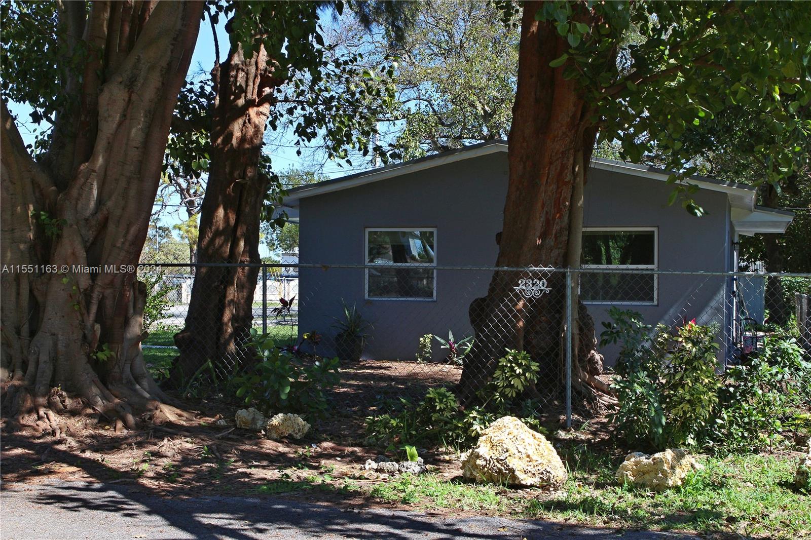 Gladeview Miami, FL 33147 - Photo 6 of 25 a front view of a house with garden