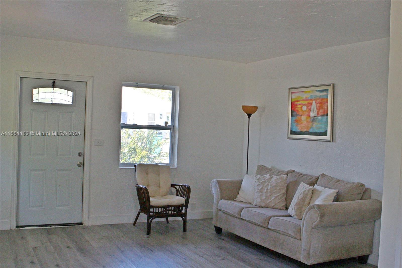Gladeview Miami, FL 33147 - Photo 9 of 25 a living room with furniture and a window