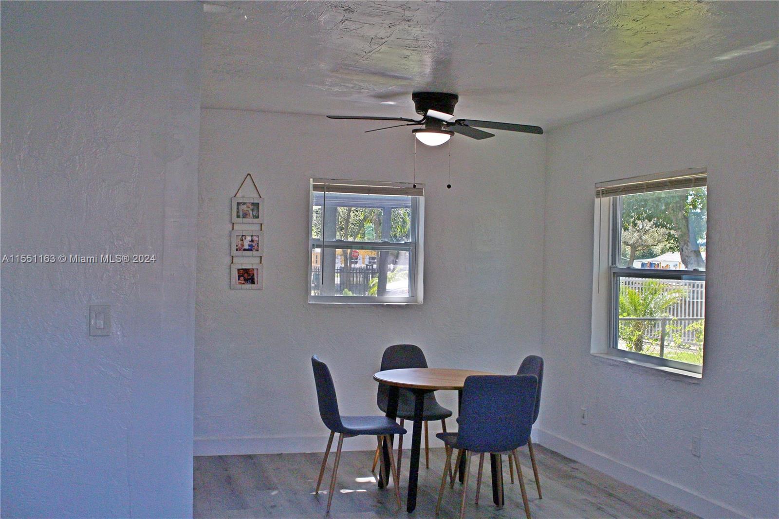 Gladeview Miami, FL 33147 - Photo 10 of 25 a view of a dining room with furniture and a window