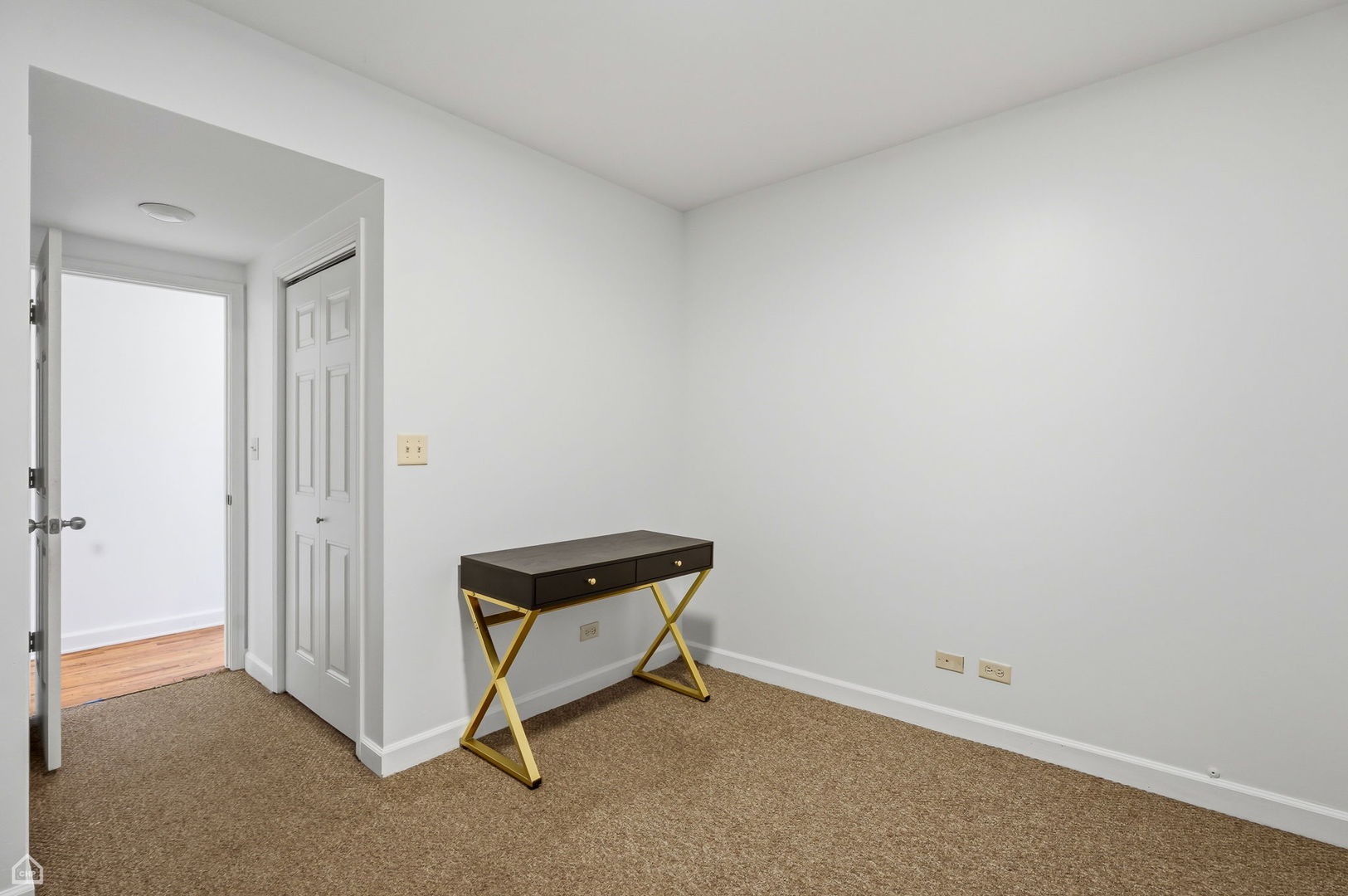 2455 West Harrison Street, Unit 2 Chicago, IL 60612 - Photo 15 of 20 a room with a chair and painted walls